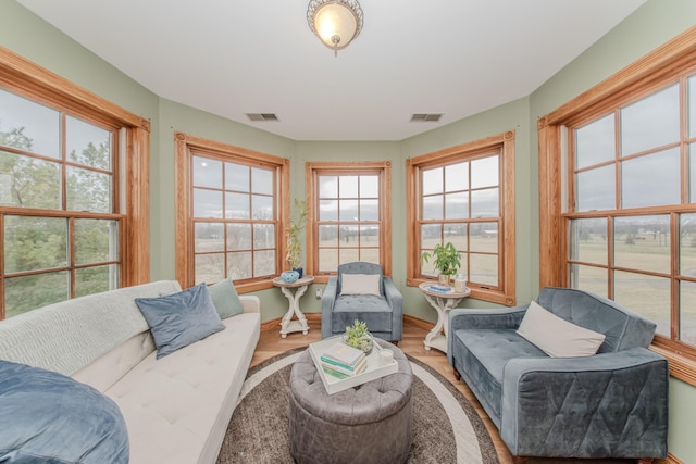 5050 Pleasant Lake Rd, Ann Arbor, MI 48103 - sunroom / solarium featuring healthy amount of natural light and wood finished floors
