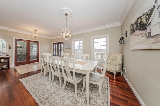 5050 Pleasant Lake Rd, Ann Arbor, MI 48103 - dining area with a chandelier, french doors, crown molding, and wood finished floors