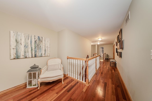5050 Pleasant Lake Rd, Ann Arbor, MI 48103 - corridor featuring an upstairs landing and wood finished floors