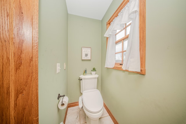 5050 Pleasant Lake Rd, Ann Arbor, MI 48103 - bathroom with toilet and tile patterned floors