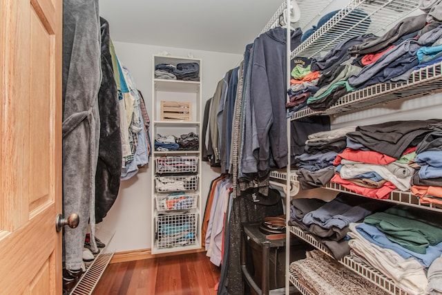 5050 Pleasant Lake Rd, Ann Arbor, MI 48103 - spacious closet featuring wood finished floors