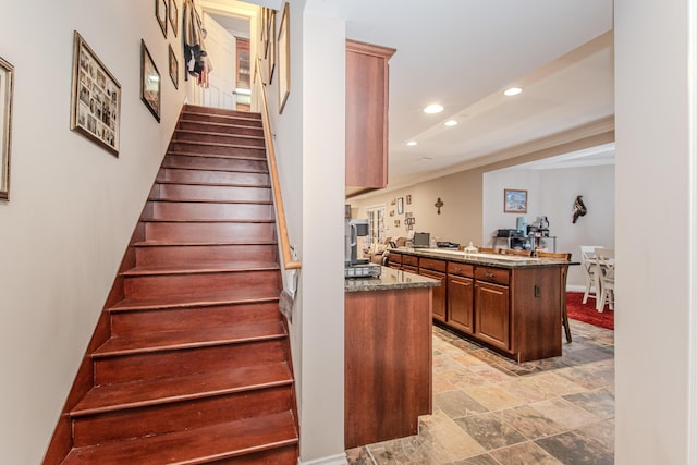 5050 Pleasant Lake Rd, Ann Arbor, MI 48103 - stairway with recessed lighting, stone finish floors, and ornamental molding