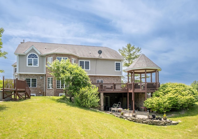 5050 Pleasant Lake Rd, Ann Arbor, MI 48103 - rear view of house with a deck, a lawn, a gazebo, and brick siding