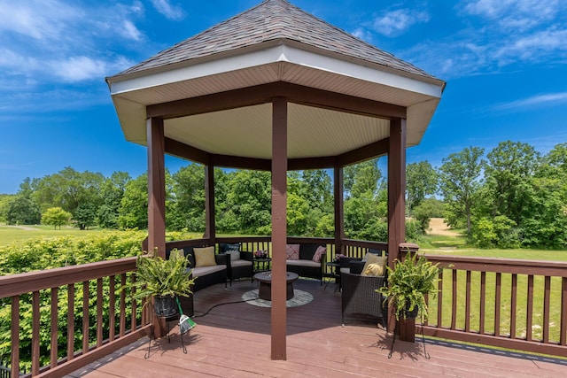 5050 Pleasant Lake Rd, Ann Arbor, MI 48103 - wooden terrace with an outdoor hangout area, a lawn, view of wooded area, and a gazebo