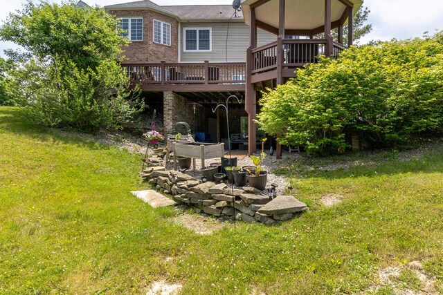 5050 Pleasant Lake Rd, Ann Arbor, MI 48103 - rear view of house with a wooden deck and a yard