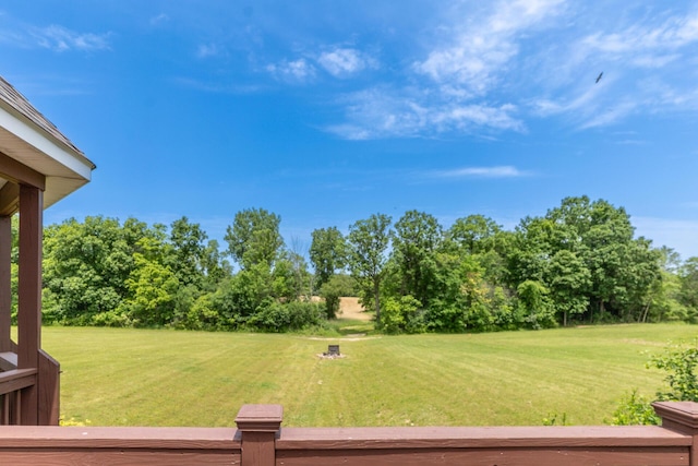 5050 Pleasant Lake Rd, Ann Arbor, MI 48103 - view of grassy yard with view of wooded area
