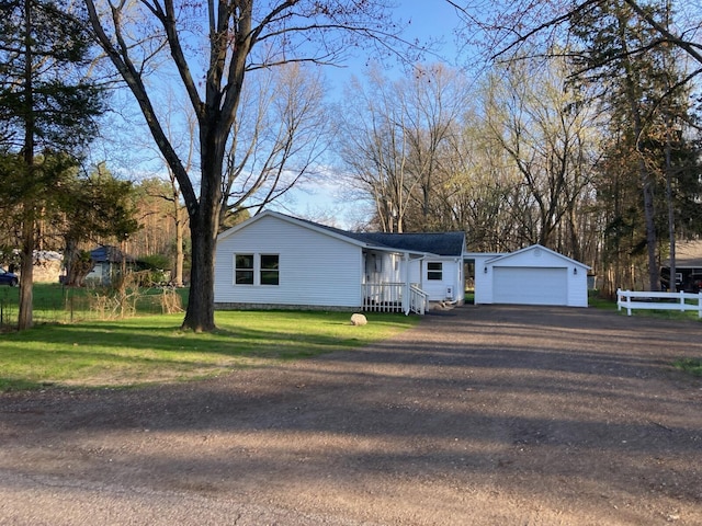 33291 56th Ave, Paw Paw, MI 49079 - view of front of house with a front lawn, fence, and aphalt driveway