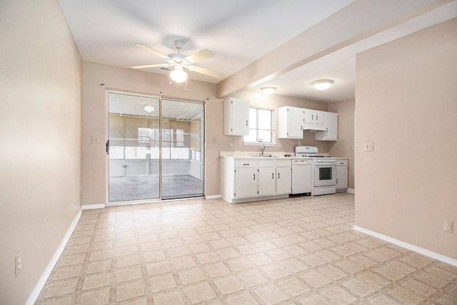 28531 Greening St, Farmington Hills, MI 48334 - kitchen featuring baseboards, white gas stove, light countertops, light floors, and ceiling fan