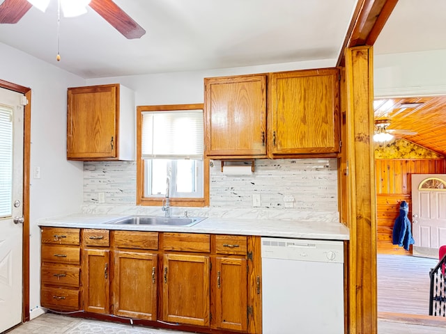 24275 Valley Ave, Eastpointe, MI 48021 - kitchen with dishwasher, a ceiling fan, decorative backsplash, and light countertops
