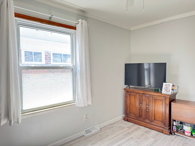 24275 Valley Ave, Eastpointe, MI 48021 - living room with healthy amount of natural light and light wood finished floors