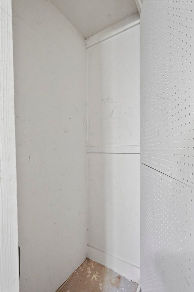 interior space with unfinished concrete floors