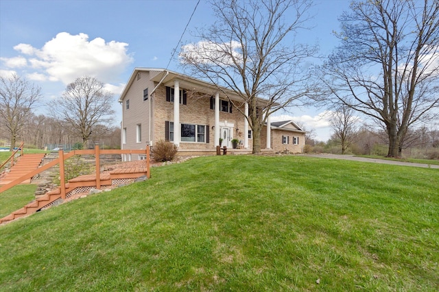 view of front of home with a front lawn