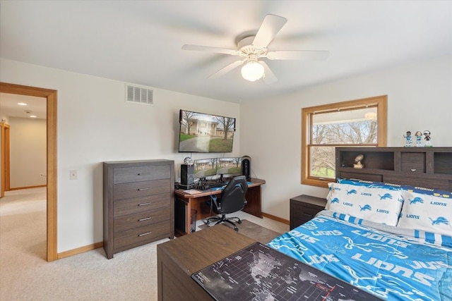 bedroom featuring visible vents, baseboards, a ceiling fan, and light colored carpet