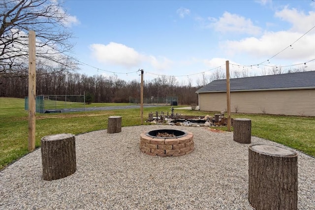 view of patio featuring an outdoor fire pit