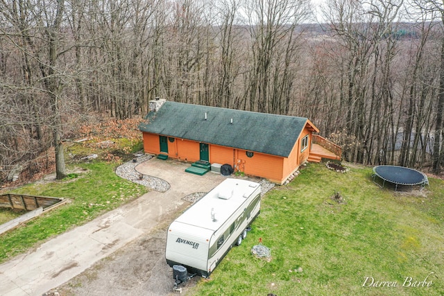 3770 Pine Ln, Saranac, MI 48881 - aerial view of property and surrounding area with a heavily wooded area