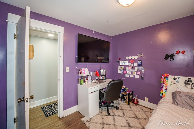 3770 Pine Ln, Saranac, MI 48881 - bedroom featuring wood finished floors and an office area