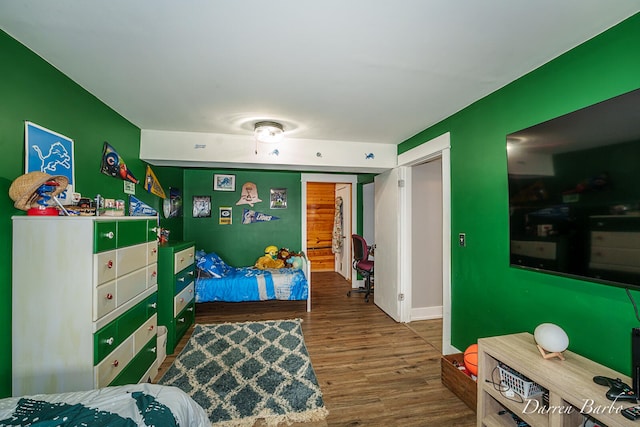 3770 Pine Ln, Saranac, MI 48881 - bedroom with wood finished floors