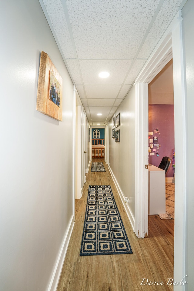 3770 Pine Ln, Saranac, MI 48881 - corridor with wood finished floors, a drop ceiling, and recessed lighting