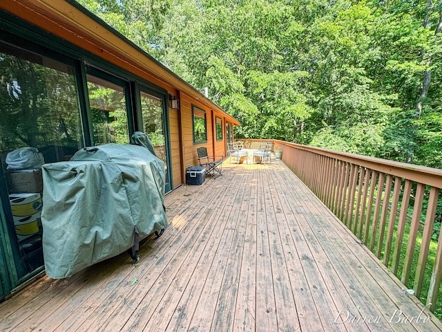 3770 Pine Ln, Saranac, MI 48881 - wooden terrace with outdoor dining area and area for grilling