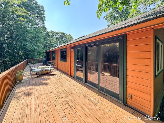 3770 Pine Ln, Saranac, MI 48881 - wooden deck featuring outdoor dining area