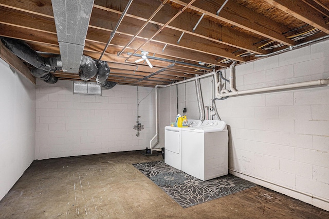 unfinished basement featuring washing machine and dryer