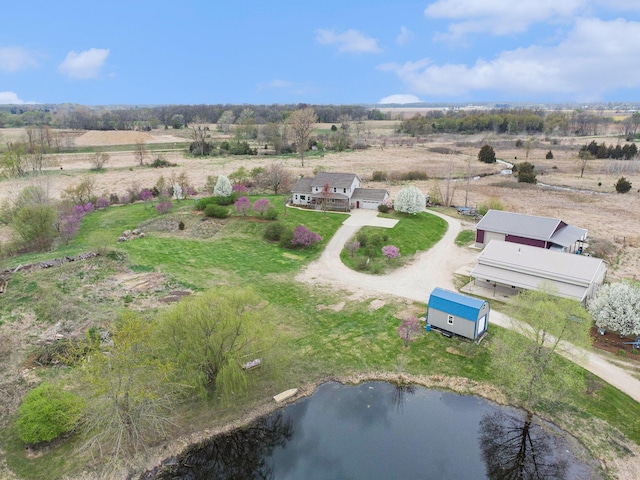 bird's eye view with a rural view and a water view