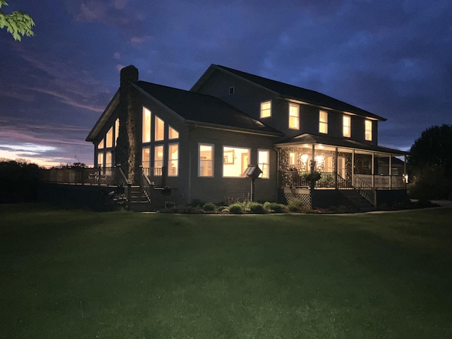 198 W Chicago Rd, Coldwater, MI 49036 - rear view of house with a chimney, stairs, a yard, and a porch