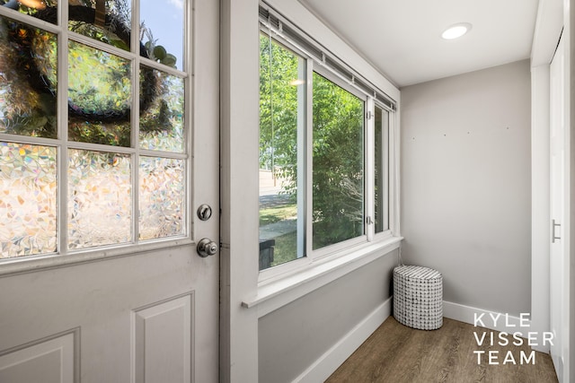 135 Houseman Ave NE, Grand Rapids, MI 49503 - doorway with wood finished floors and baseboards