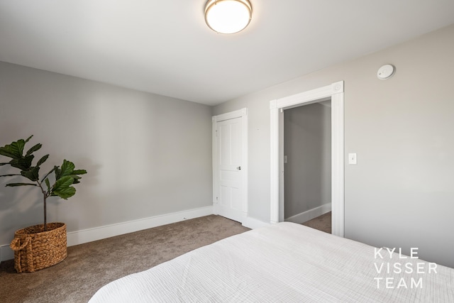135 Houseman Ave NE, Grand Rapids, MI 49503 - bedroom featuring carpet and baseboards
