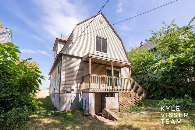 135 Houseman Ave NE, Grand Rapids, MI 49503 - rear view of house featuring a gambrel roof