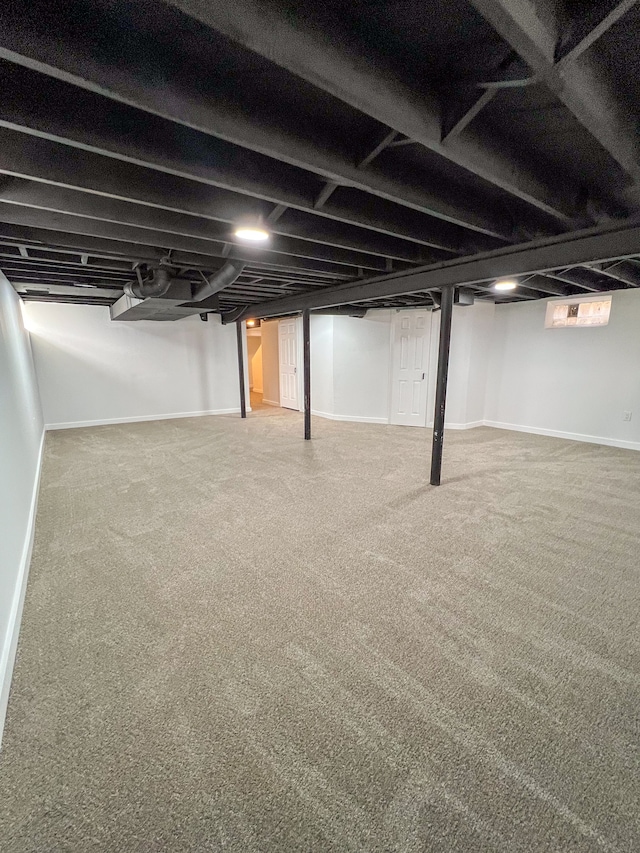 finished below grade area with carpet and baseboards