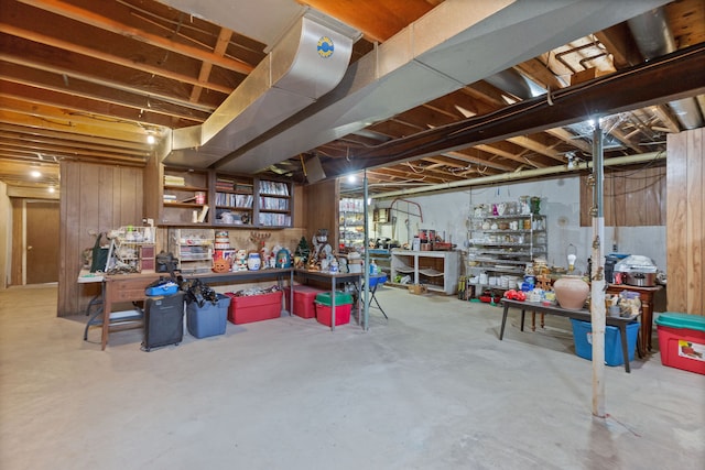 2975 Hadden Rd, Rochester, MI 48306 - unfinished basement featuring a workshop area