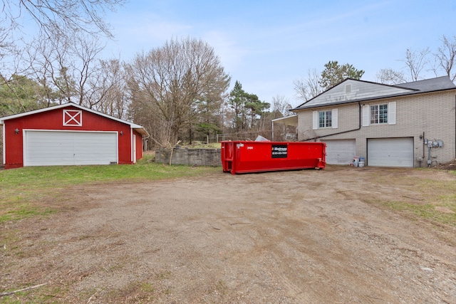 2975 Hadden Rd, Rochester, MI 48306 - view of yard featuring an outbuilding and dirt driveway