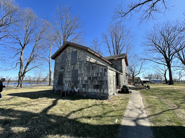 view of home's exterior featuring a lawn