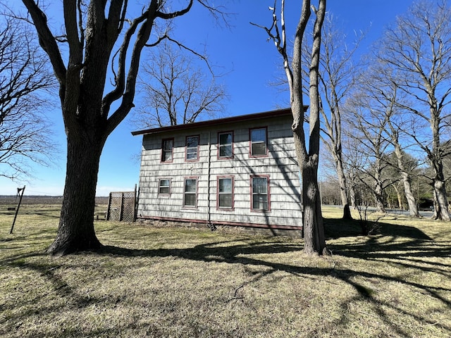 exterior space with a yard