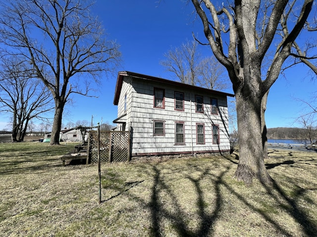 view of side of property featuring a water view