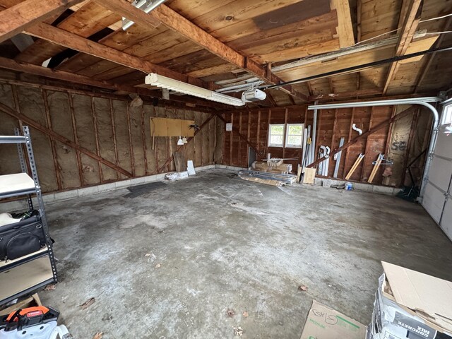 617 Cherry Ave, Big Rapids, MI 49307 - garage featuring a garage door opener