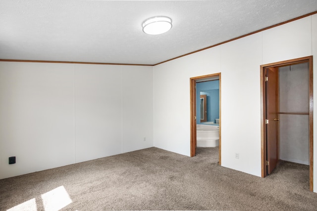 1827 Magnolia St, Newport, MI 48166 - unfurnished bedroom with crown molding, carpet, ensuite bathroom, and a textured ceiling