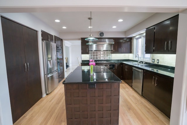 45778 Fermanagh Dr, Northville, MI 48168 - kitchen featuring a sink, stainless steel appliances, light wood-type flooring, and wall chimney exhaust hood