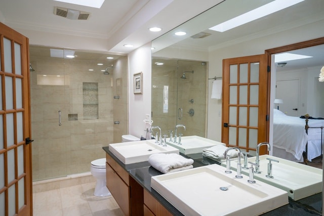 45778 Fermanagh Dr, Northville, MI 48168 - ensuite bathroom featuring visible vents, toilet, crown molding, and a sink