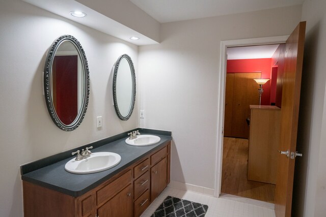 45778 Fermanagh Dr, Northville, MI 48168 - bathroom with tile patterned floors, recessed lighting, double vanity, and a sink