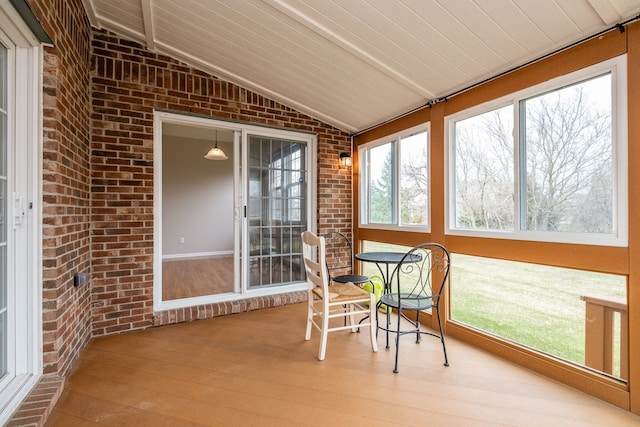 49128 Rainbow Ln S, Northville, MI 48168 - sunroom featuring wood-type flooring, a wealth of natural light, and lofted ceiling