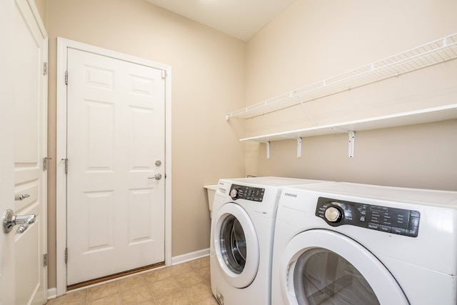 49128 Rainbow Ln S, Northville, MI 48168 - laundry room featuring laundry area, separate washer and dryer, and baseboards
