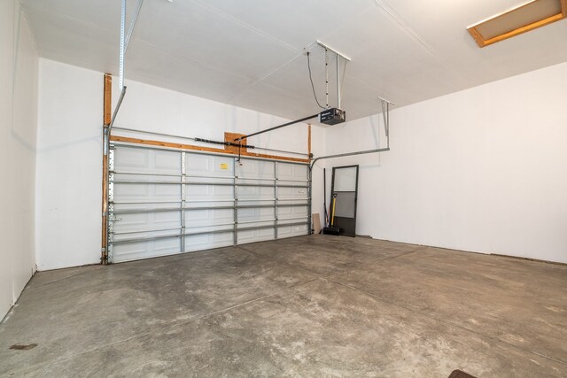 49128 Rainbow Ln S, Northville, MI 48168 - garage with a garage door opener