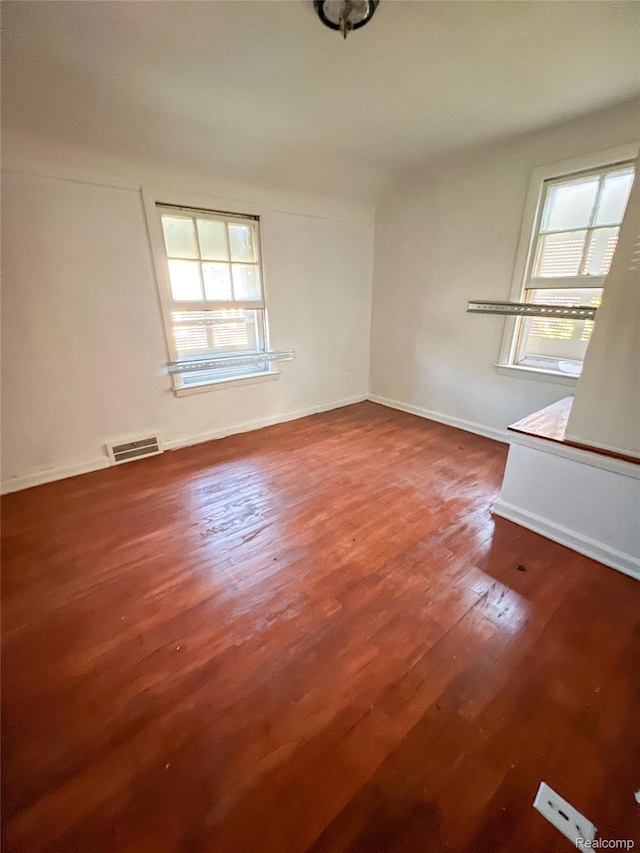 3945 Devonshire Rd, Detroit, MI 48224 - spare room featuring wood finished floors and baseboards