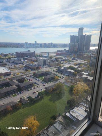 1300 E Lafayette St Unit 2803, Detroit, MI 48207 - aerial view of property and surrounding area with nearby urban area and a nearby body of water