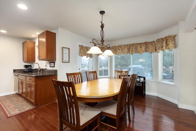 dining room featuring baseboards, dark wood-style floors, and recessed lighting