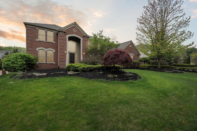 45055 Walnut Rdg, Northville, MI 48168 - traditional home with brick siding and a front yard