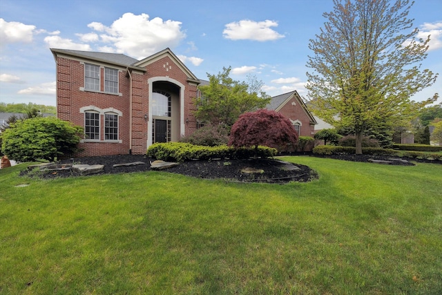45055 Walnut Rdg, Northville, MI 48168 - traditional-style home with brick siding and a front yard