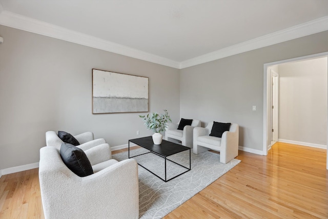 45055 Walnut Rdg, Northville, MI 48168 - living area with ornamental molding, light wood finished floors, and baseboards
